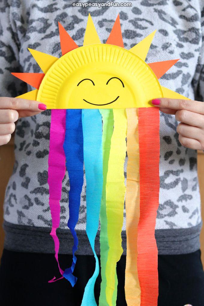 Sunshine and Rainbows craft made from a paper plate and rainbow colored streamers